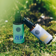 a bottle of 7 Flower Extract of Genius and Essence of Zen on grass